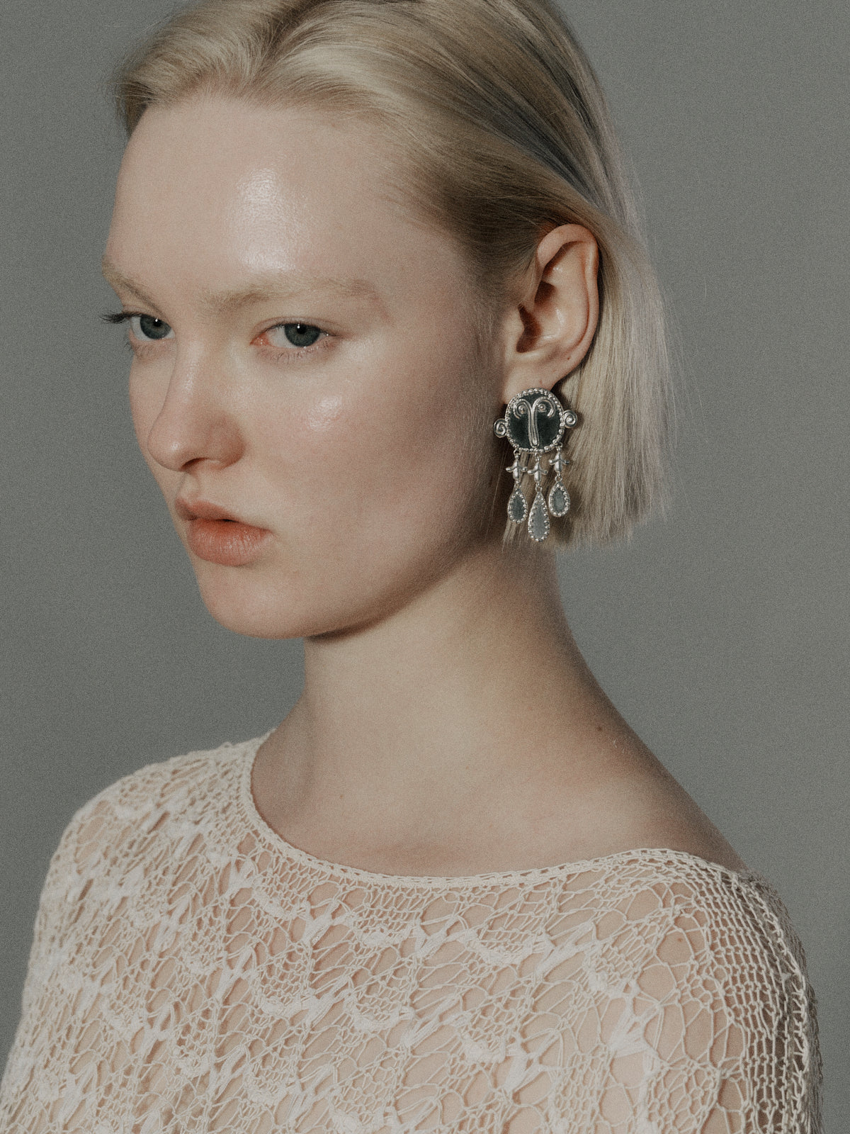 Silver round-face pendant drop earrings with hanging chain tassels