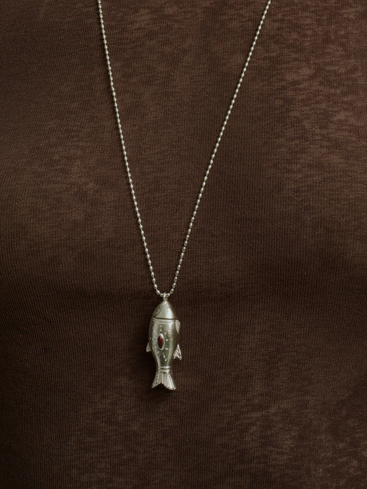 Silver fish box pendant necklace close-up on bead chain