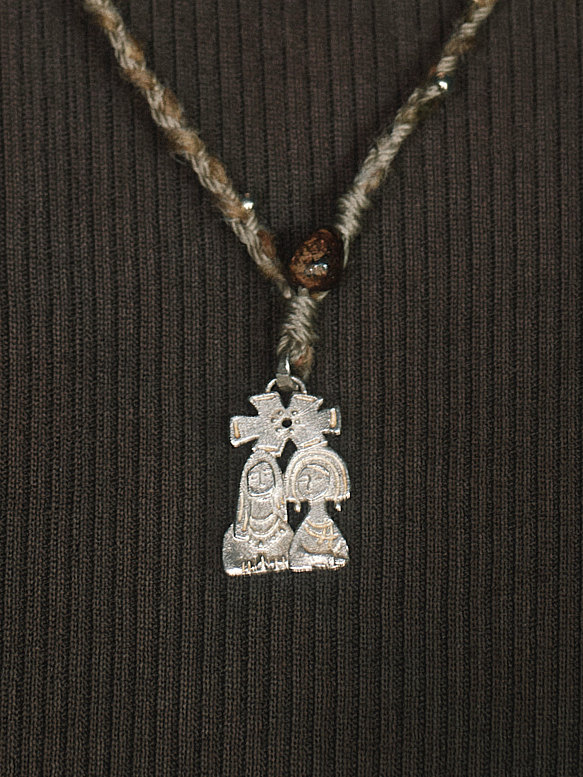 Silver-tone charm pendant necklace with large bejeweled cat figure pendant